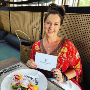 Kylie at breakfast with her birthday card.