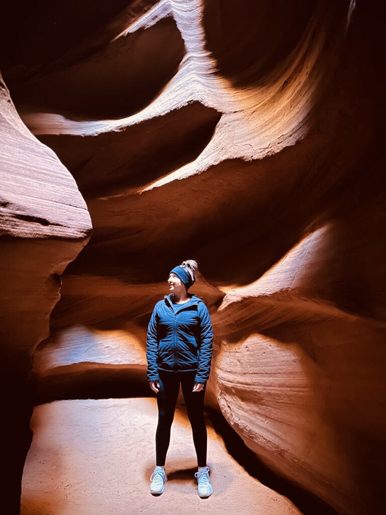 Kylie admiring the inside of the Upper Antelope Canyon