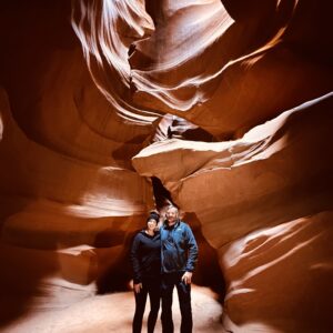 Kylie and Michael standing inside the Upper Antelope Canyon