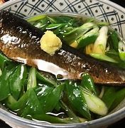 Grilled eel served with a light, fragrant dashi broth