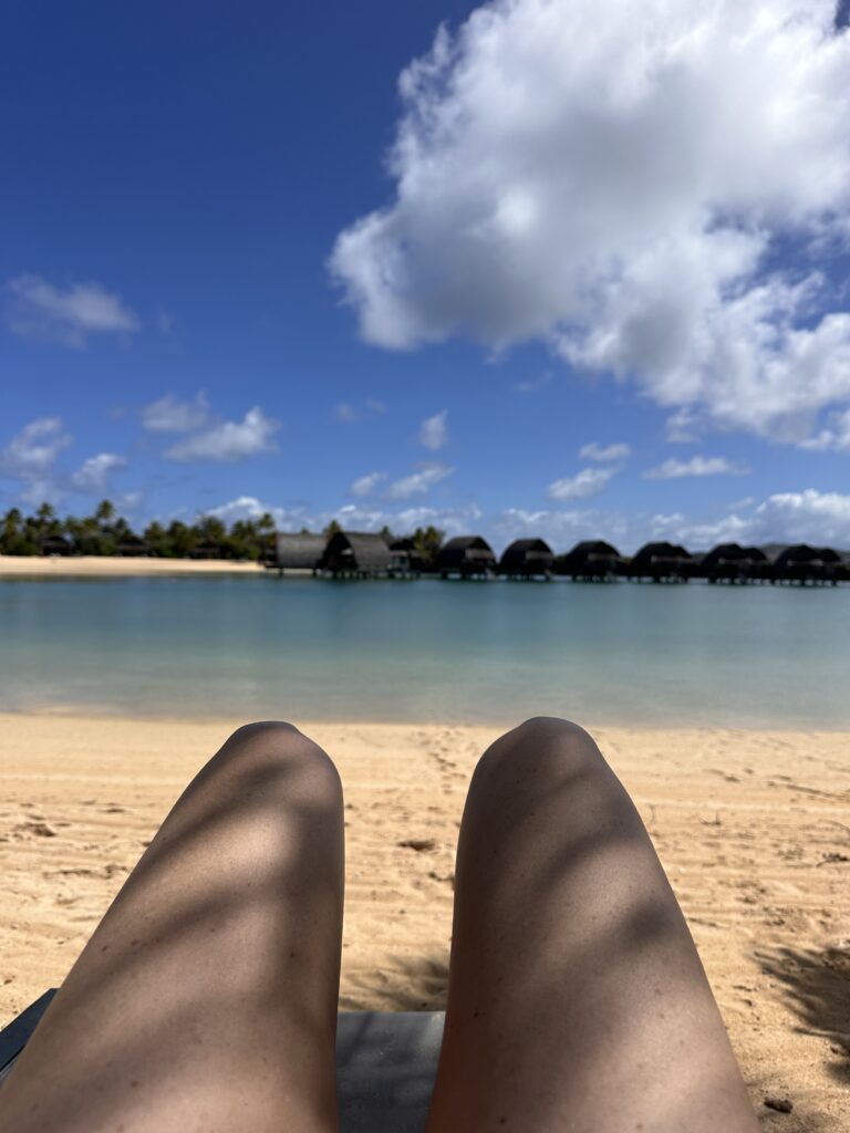 Laying on the sand looking at the Lagoon